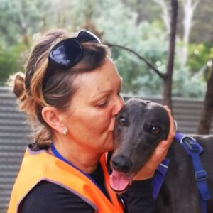 greyhound with volunteer