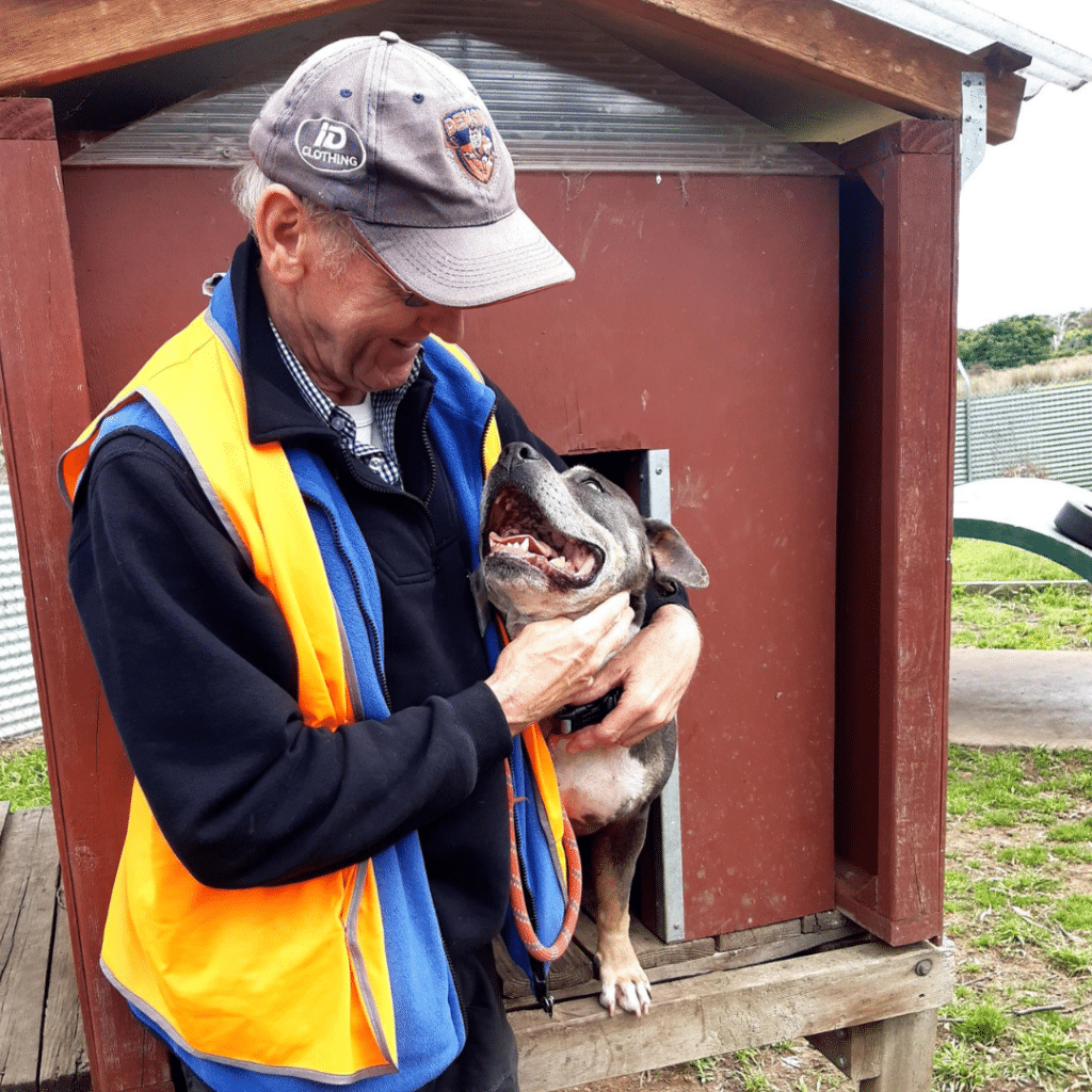 Hans cuddling with Skye at the Hobart Home
