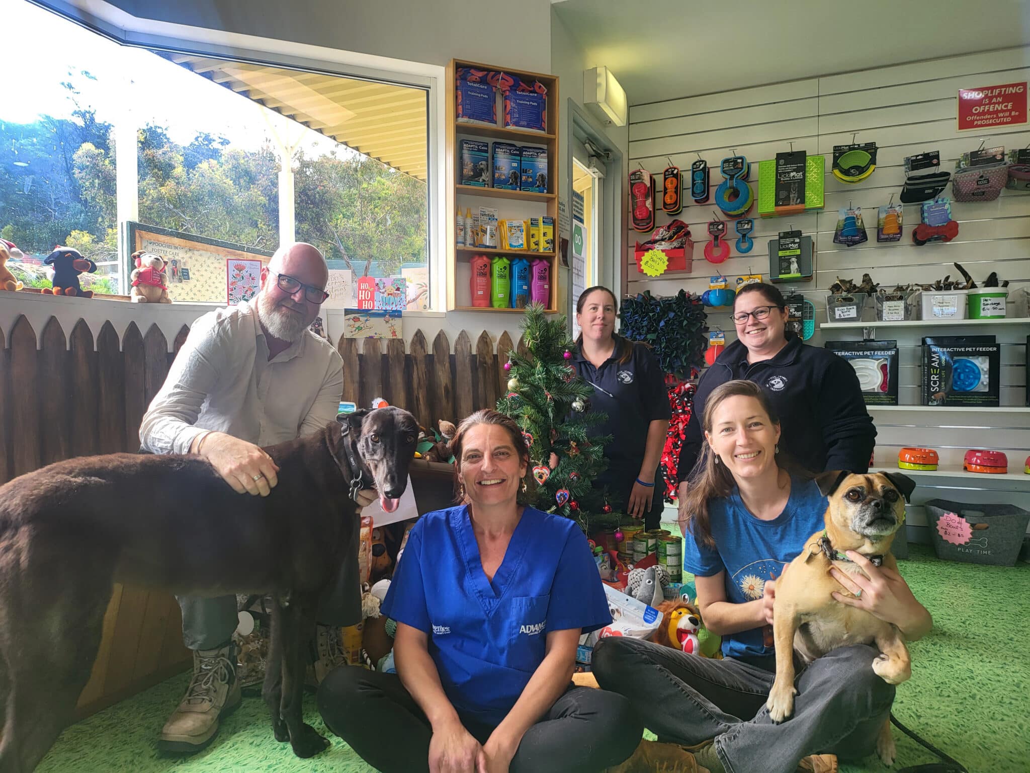 Staff around Christmas tree