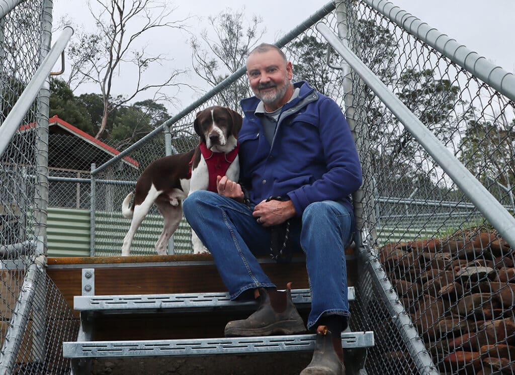 Volunteer Richard Moore with dog Boof